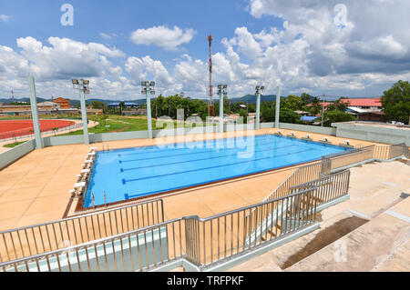 Competitive swimming pool / View on stand outdoors swimming pool with blue water surface Stock Photo