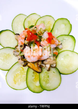 seafood salad decorated with cucumber Stock Photo