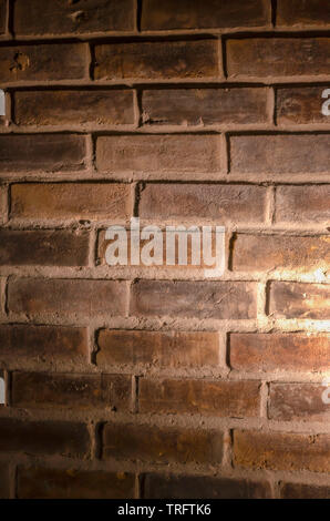 blank brick wall under spot light Stock Photo