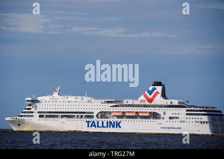 DAUGAVGRIVA, LATVIA. 1st of June 2019. TALLINK company's ferry Romantika near mole goes to Stockholm, Sweden. Stock Photo