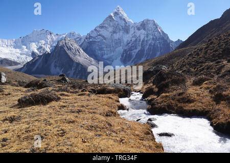 View of Ama Damblam (6812m) from the route up mountain pass Kongma La, Everest Region, Nepal. Stock Photo