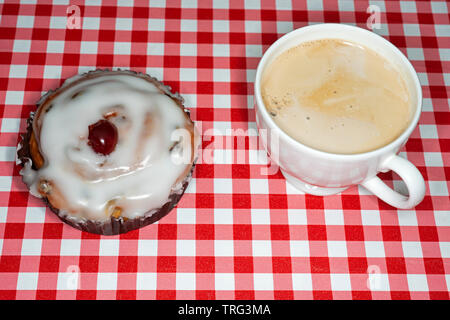 Iced Belgium bun with coffee Stock Photo