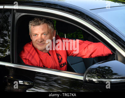 Manchester United Manager Ole Gunnar Solskjaer posing for a photograph on his was to training. Stock Photo