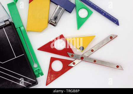 Scissor, cutter ando other stationery objects, isolated on a white background Stock Photo