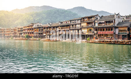 Old Chinese houses on riverside in Fenghuang ancient town in Hunan China Stock Photo