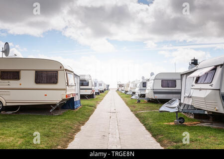 Caravan camping on the beach. Family vacation in caravan park. North sea coast, Germany Stock Photo