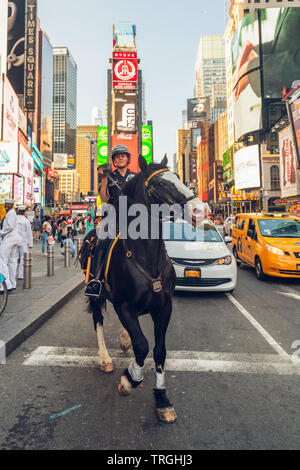 New York City/USA -May 26, 2019 Times Square, Neon Lights, Traffic, Tourists. An NYPD Police Horse Escaped in Times Square. Stock Photo