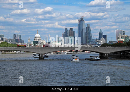View of the City of London, St Pauls Cathedral, buses on Waterloo Bridge and boats on River Thames London England UK  Europe   KATHY DEWITT Stock Photo