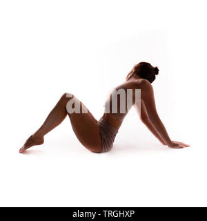 Yoga alphabet. The letter M formed by body of yogi Stock Photo