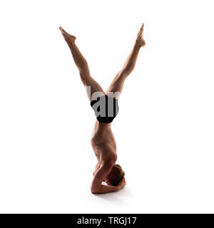 Yoga alphabet. The letter Y formed by gymnast body Stock Photo