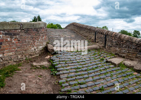 Roving or Turnover Bridge at Junction of Trent and Mersey and Staffordshire and Worcestershire Canals at Great Haywood, Staffordshire.England Stock Photo