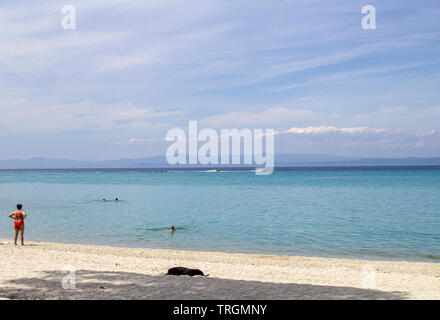 .The beautiful white sandy beach and clear blue water of Chanioti, Halkidiki, greece. Stock Photo