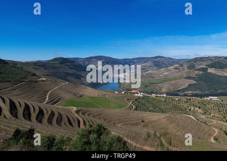 View of Douro Valley with the Pinhao village, terraced vineyards and the Douro River, in Portugal; Concept for travel in Portugal and most beautiful p Stock Photo