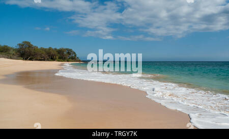 Wide angle view of an idyllic empty beach in Maui Stock Photo