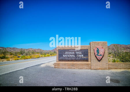 Joshua Tree NP, CA, USA - April 21, 2017: A welcoming signboard at the entry point of preserve park Stock Photo