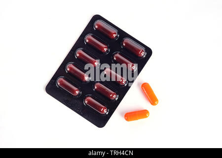 Vitamin C capsule on white background Stock Photo