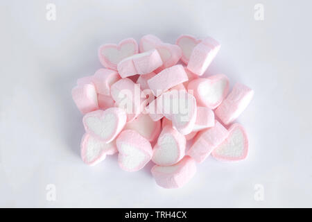 Pink heart shaped marshmallows isolated on white back ground Stock Photo -  Alamy