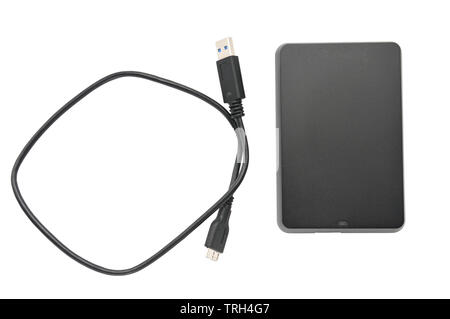 Portable hard drive for backing up various files on an isolated white background Stock Photo