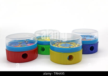Set of vintage plastic pencil sharpeners, isolated on white background, close-up Stock Photo