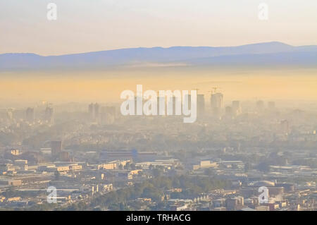 Haifa Bay covered in smoke and smog. The Inversion layer is visible. Haifa's industrial area is one of the largest sources of air pollution in the cou Stock Photo