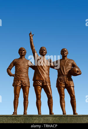 Holy Trinity Statue Outside the Manchester United Stadium, Old Trafford, Manchester, United Kingdom Stock Photo