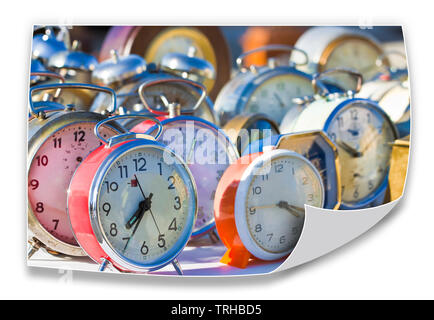 Time passes inexorably - Old colored metal table clocks - concept image Stock Photo