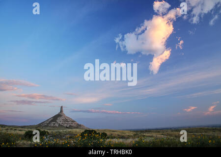 Chimney Rock National Historic Site in early morning, western Nebraska, USA. The peak of Chimney Rock is 1289 meters above sea level. Stock Photo