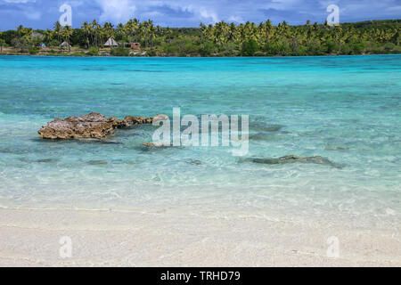 View of Faiava Island from  Ouvea, Loyalty Islands, New Caledonia. Faiava Island has a land area of only around 50 acres. Stock Photo