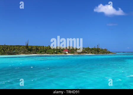 View of Faiava Island from  Ouvea, Loyalty Islands, New Caledonia. Faiava Island has a land area of only around 50 acres. Stock Photo