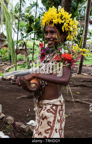 Girl in traditional Tapa Dress, Tufi, Oro Province, Papua New Guinea Stock Photo