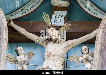 Close up of Jesus Christ on the cross. Captured alongside a hiking trail near Possenhofen (Upper Bavaria, near Lake Starnberg) Stock Photo