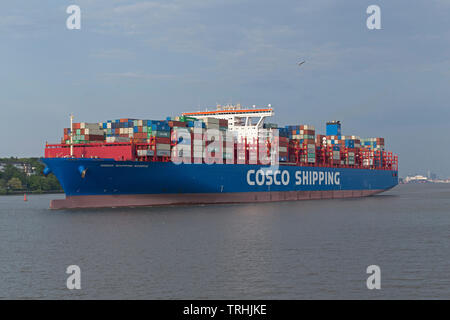 container ship Scorpio leaving Hamburg, Germany Stock Photo