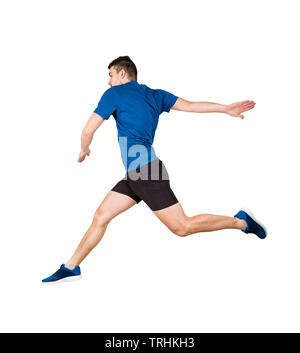 Side vie full length of determined caucasian man athlete jumping over imaginary obstacle isolated over white background. Young guy runner wearing blac Stock Photo