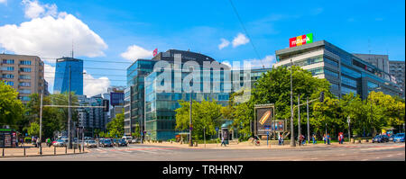 Warsaw, Mazovia / Poland - 2019/06/01: Panoramic view of downtown Warsaw at the junction of Krolweska and Marszalkowska streets with modern office arc Stock Photo