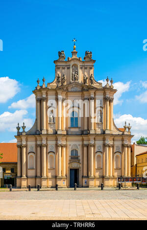 Warsaw, Mazovia / Poland - 2019/06/01: Front view of the rococo Visitationist St. Joseph Church – known as Kosciol Wizytek - at the Krakowskie Przedmi Stock Photo