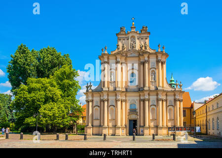 Warsaw, Mazovia / Poland - 2019/06/01: Front view of the rococo Visitationist St. Joseph Church – known as Kosciol Wizytek - at the Krakowskie Przedmi Stock Photo