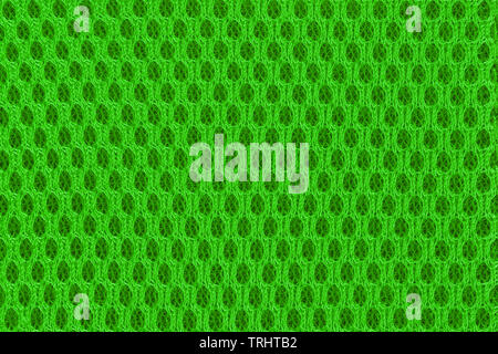 Green modern poriferous material close up. Sportswear material for abstract background and texture Stock Photo