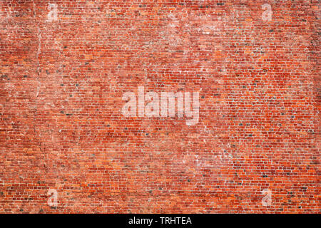 Large red rough brick wall. Texture and background Stock Photo