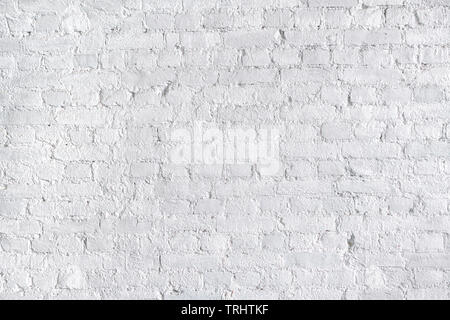 White rough brick wall close up. Texture and background Stock Photo