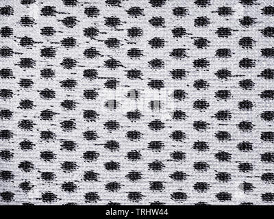 Black and white spotted fabric close up. Texture and background Stock Photo