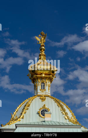 West wing of the Grand Peterhof Palace, the 'Coat-of-Arms Pavilion' - the Special Treasury Museum. Dome with heraldic double-headed eagle Stock Photo