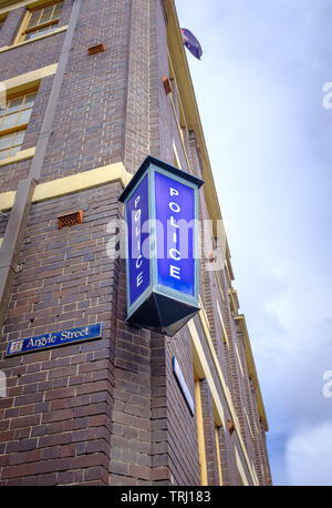 Traditional blue Police station lamp on the corner of Argyle Street and George Street in The Rocks, a historic area of Sydney, New South Wales Austral Stock Photo