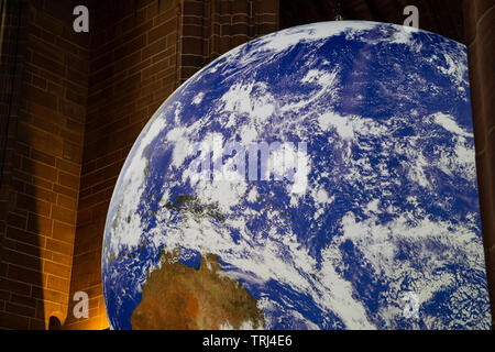 Gaia, 23ft replica of the Earth, by artist Luke Jerram, displayed in Liverpool Cathedral, Liverpool, UK Stock Photo