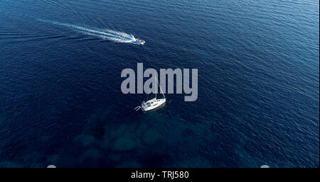 Boat at sea leaving a wake Stock Photo