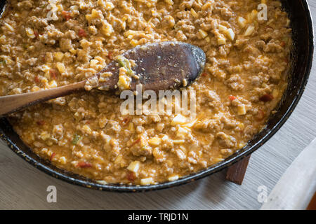 prepared for lasagna in a pan, minced meat with egg and pepper Stock Photo