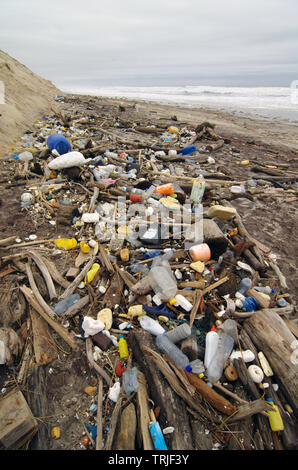 Trash beach pollution. Garbage, plastic, and wastes on the beach Stock Photo