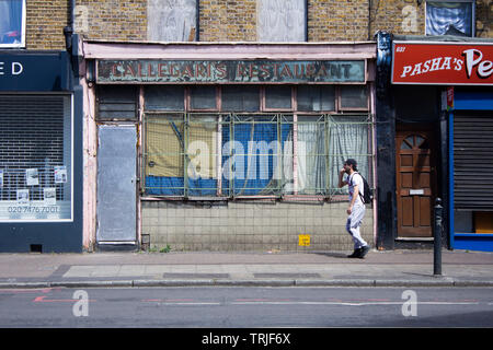 Derelict shop window at Commercial Road, Limehouse, London, Stock Photo