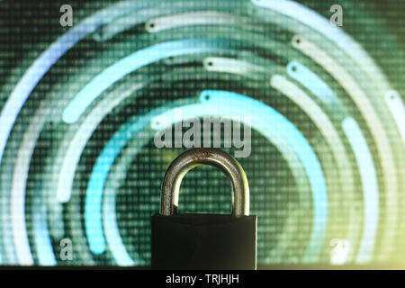 closed padlock in front of green matrix and circular lines background. cyber and computer security concept. privacy protection against hackers, virus Stock Photo