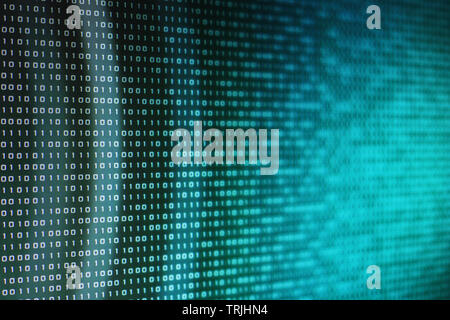 Binary code computer theme background. selective focus image of led display showing computer language matrix. out of focus circular light in the back. Stock Photo