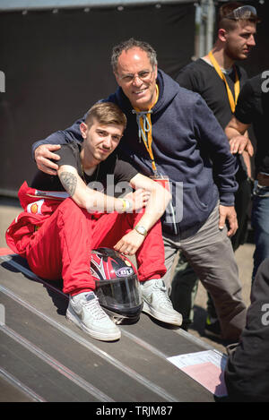 24 May 2019 Berghem, the Netherlands. SHELL ECO-MARATHON CHALLENGER EVENT - OSS -  Team Comandini -Car 312 - Teacher Ermico Davino (right) posing with Stock Photo